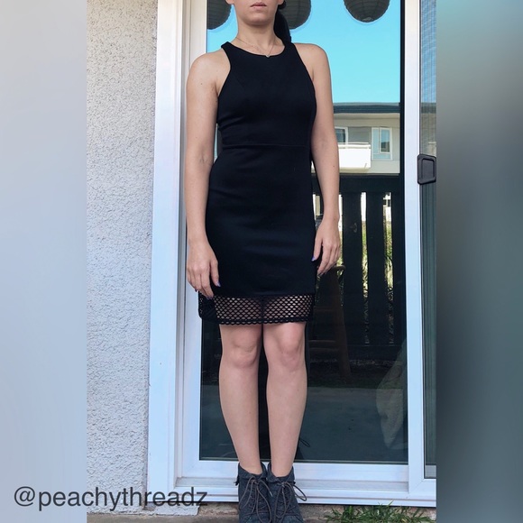 Black dress with net accent - Picture 2 of 4